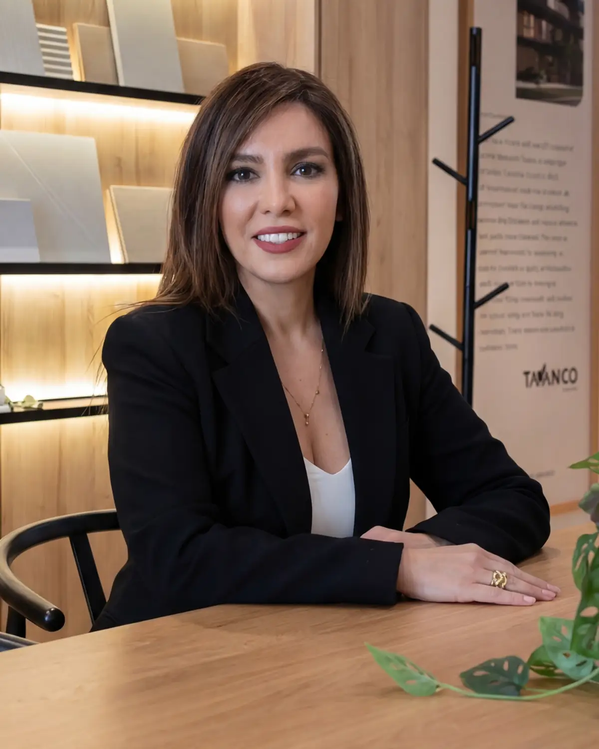 Sanam Farid seated at the table in the WREN Upper Westside presentation centre