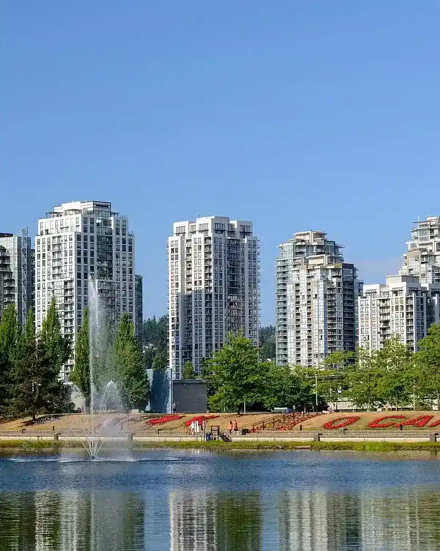 Lafarge Lake in Coquitlam with city buildings beyond