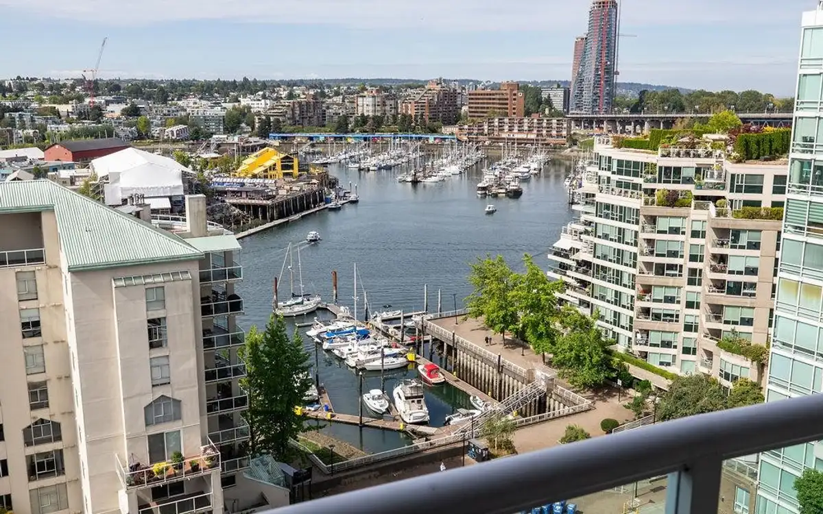 Balcony outlook over False Creek marina, Granville Island, and the downtown skyline