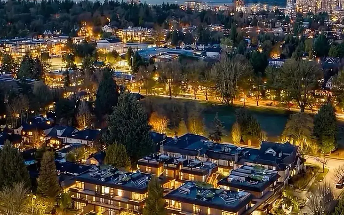 WREN Upper Westside development glowing at dusk on Vancouver's West Side