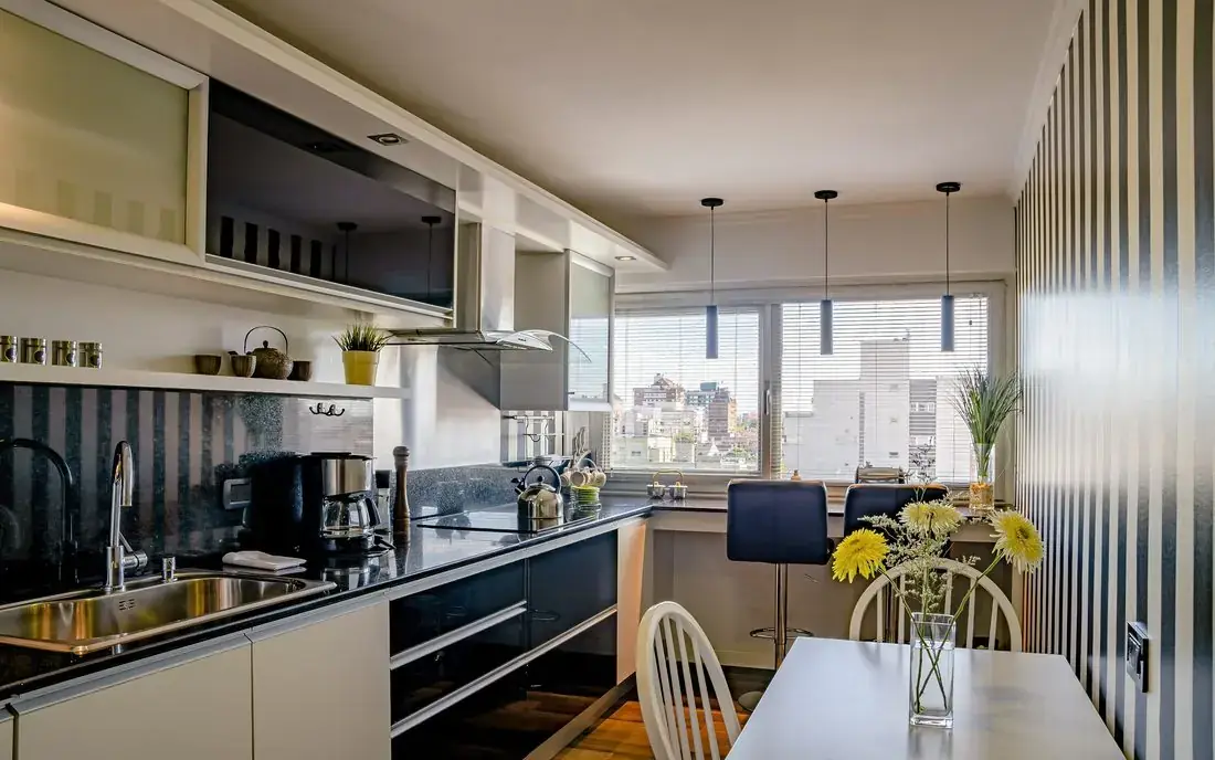 Modern kitchen and dining area in a Burke Mountain family townhome